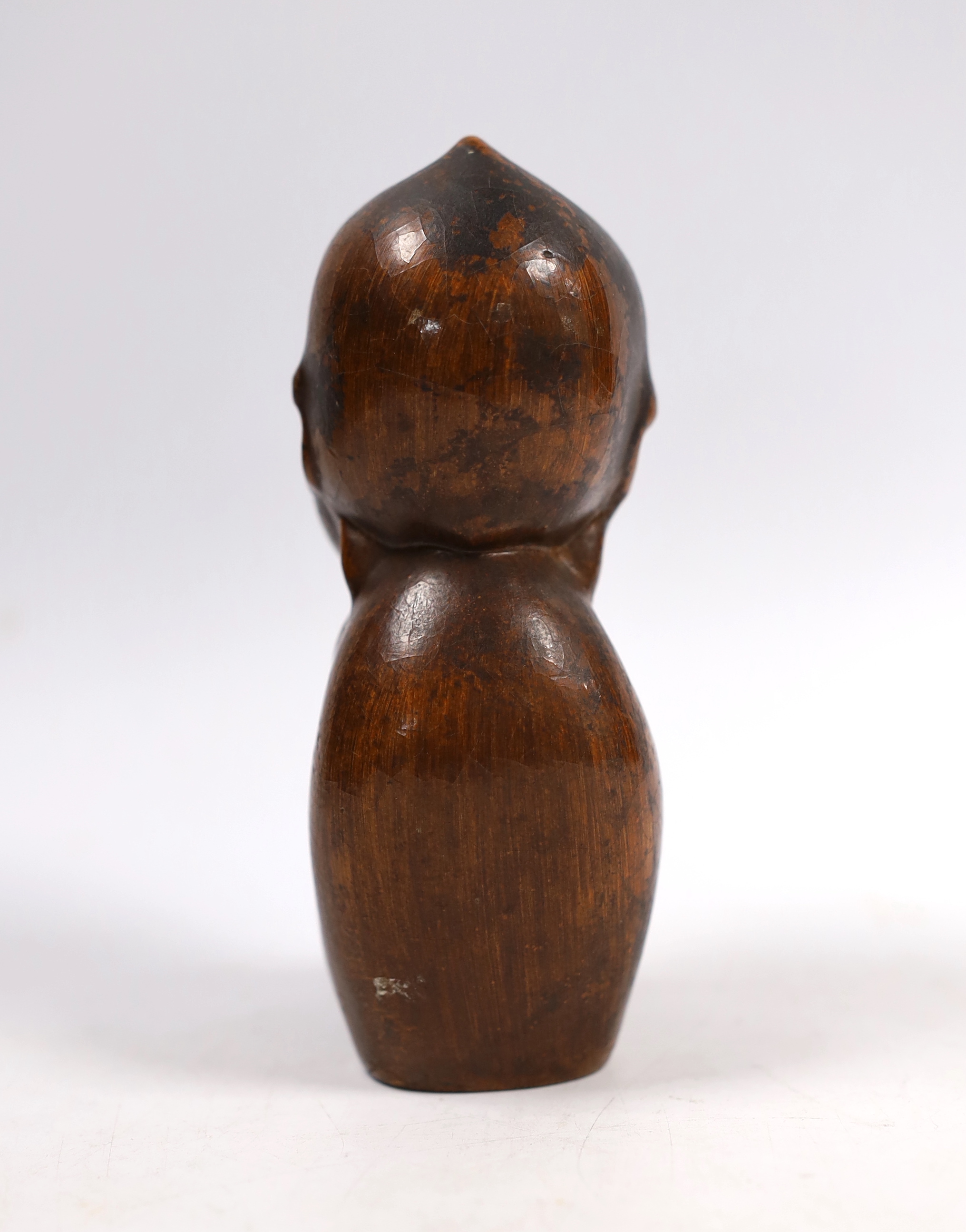 A Kewpie composition figure with painted eyes, 14cm high